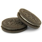 Two Oreo cookies on a white background.