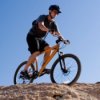 Man riding a mountain bike.