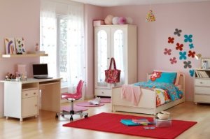 Photo of an organized girls bedroom.