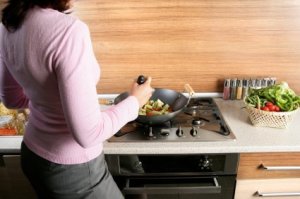 Woman Cooking in the Kitchen