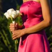 A woman wearing a homemade bridesmaid dress.
