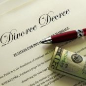 Divorce Decree With Pen and 20 Dollar Bill