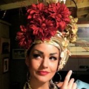 A close up of the Carmen Miranda costume, with a fancy flowered hat.