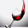 Red Wine Spilling Out of Glass