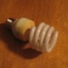 Florescent light bulb on table
