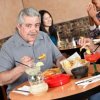 A man eating at a mexican restaurant.