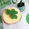 Making a Potato Stamp, Shamrock potato stamp with green paint.