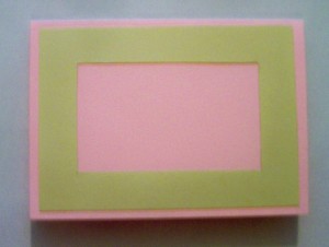 Glue the frame to the front of the card
