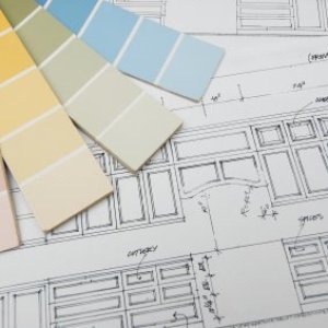 Paint chips on a kitchen blueprint.