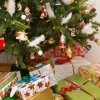 A decorated Christmas tree and wrapped presents.
