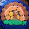 Cupcakes decorated to make a turkey using several with different frostings.. 