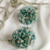 Yarn pom poms.