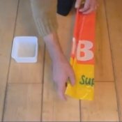 Video of folding plastic bags into small triangles.
