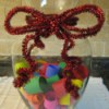 Memory jar with decorative ribbon.