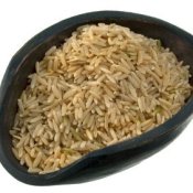 Scoop of brown rice.