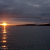 Mt. Rainer at Sunrise from Across Puget Sound With Lens Flare Sun