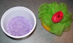 Purple Bath salts in plastic container
