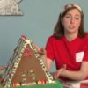 Making a Gingerbread House, Woman Demonstarting Gingerbread House Construction
