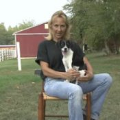 Housebreaking a Puppy, Woman With Puppy on Her Lap