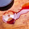 Red wine spill on wood table