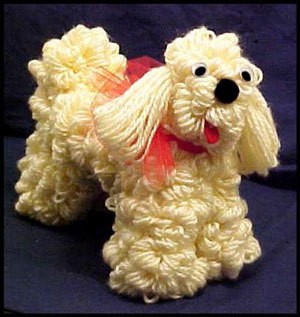 Photo of a finished dog made out of yarn.