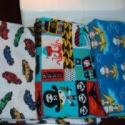 Homemade pillowcases with colorful designs.