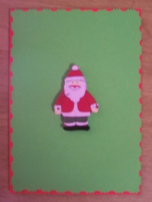 Glue the Christmas ornament to the front of the card.