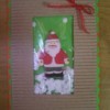 Make a small bow with the ribbon and glue it in position in the top right corner.