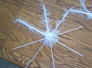 Wrapping the points of the star.