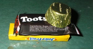 Reese's mini cup on top of Tootsie.