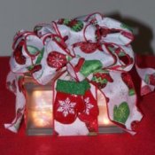 Glass block gift wrapped as a package.
