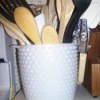 Milk glass jar utensil holder.
