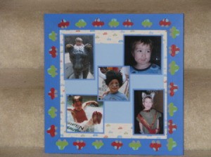 framed child's photos on scrapbook paper.