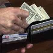 How to Save Money, Man taking money from his wallet.