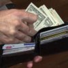 How to Save Money, Man taking money from his wallet.