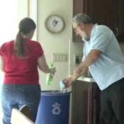 Recycling Basics, Man and Woman Recycling Plastic Bottle