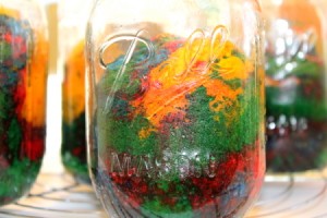 Rainbow cake baked in a mason jar.