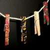 Brightly colored painted wooden clothespins.