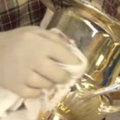 How to Clean Silver, Man Polishing Silver