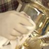 How to Clean Silver, Man Polishing Silver