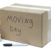 Box that says moving day on it.
