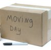 Box that says moving day on it.