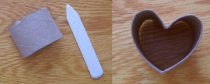 Cut roll, bone folder, and shaped heart.