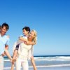 Planning a Family Vacation, Happy Family at the Beach