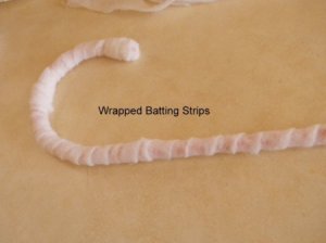 Cane wrapped with batting strips.