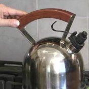 Feng Shui Home Tips for Attracting Wealth, Hand on Water Kettle