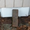 Makeshift Vent Hole Covers - Plastic bags and styrofoam with a brick holding it in place.