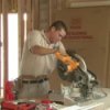 Home Improvement - Installing Crown Molding, Man Cutting Crown Molding