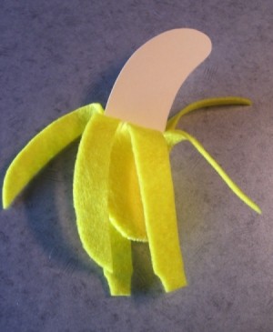 Banana peel with blank card.