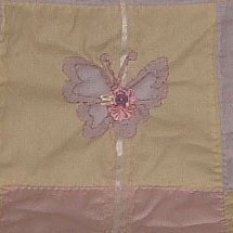 Butterfly baby quilt block.
